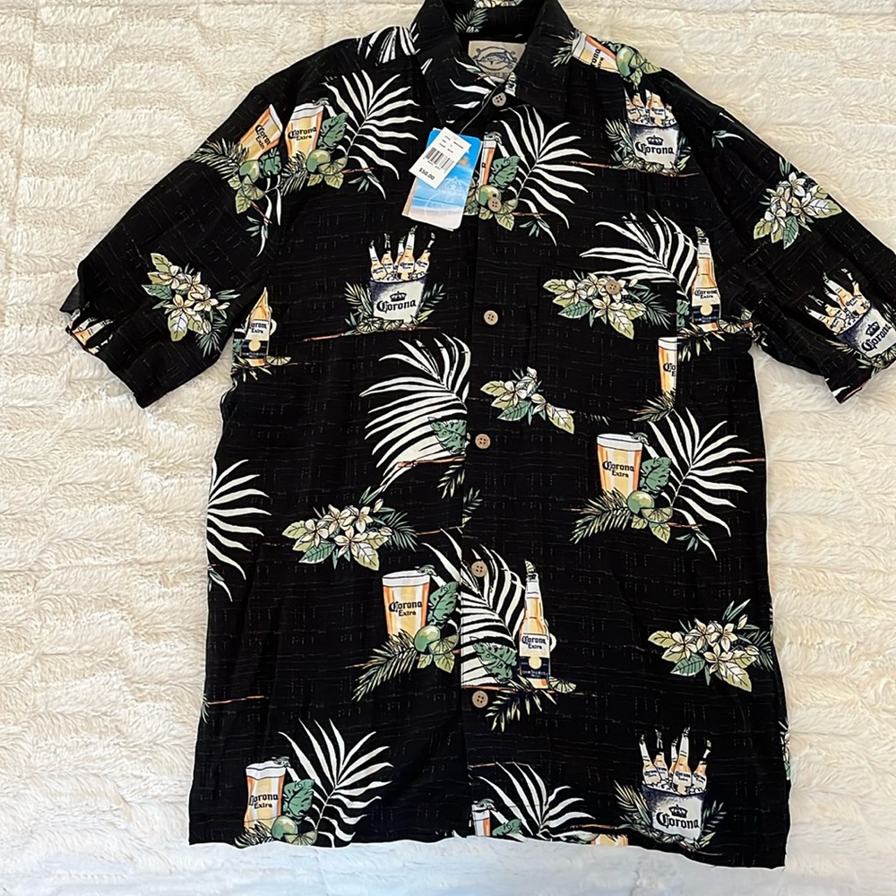 New with tags…short sleeve button down Hawaiian style shirt.